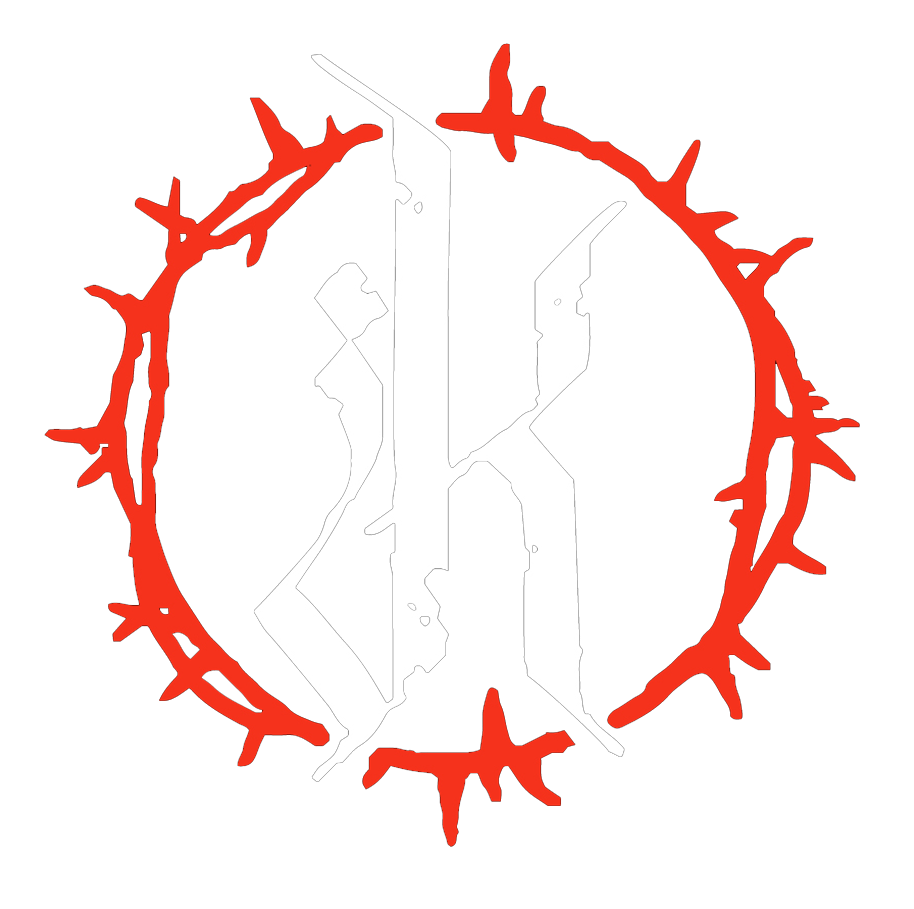 A white letter K in a gothic font within a circle of red thorns